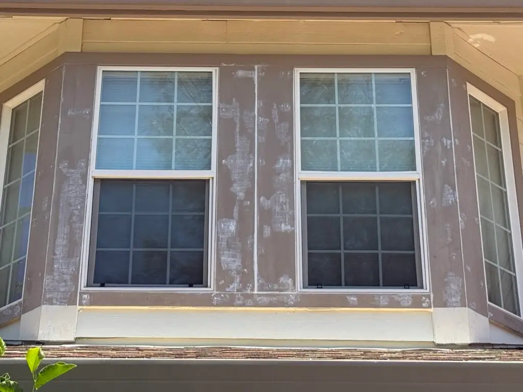 Second Story Bay Window Caulking and Painting in Palo Cedro — exterior window caulking