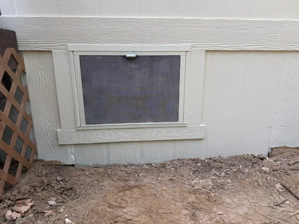 Crawlspace Access Door Installation in Cottonwood — caulking